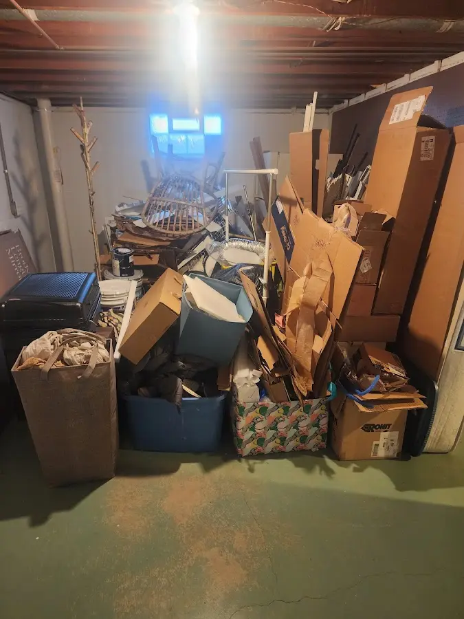 Roll-off dumpster container at job site for 6 Yard Dumpster Rental in Norton